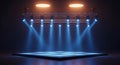 Empty stage with blue spotlights and warm overhead lights image Royalty Free Stock Photo