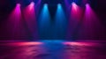 An empty stage is dramatically lit with vibrant blue and purple spotlights Royalty Free Stock Photo