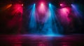 An empty stage is dramatically lit with vibrant blue and purple spotlights Royalty Free Stock Photo