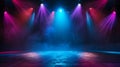 An empty stage is dramatically lit with vibrant blue and purple spotlights Royalty Free Stock Photo