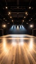 Empty Stage Lit with Spotlight and Stage Lighting on Wooden Floor Royalty Free Stock Photo