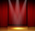 Empty stage with red curtain and spotlight on wooden floor Royalty Free Stock Photo