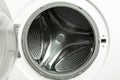 An empty bubbled drum of white washing machine through opend door Royalty Free Stock Photo