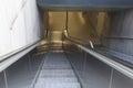 Empty stairway and escalator at a subway station Royalty Free Stock Photo