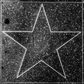 The empty star on the sidewalk of Hollywood Boulevard Walk of fames Royalty Free Stock Photo