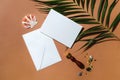 Empty card and envelope, tropical sea decor creative concept. Summer trendy flat lay