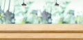 Empty step wood table top food stand with blur green tree at