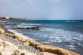 Empty stone beach on Limassol seafront on a sunny spring day