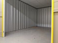 An empty self storage unit room Royalty Free Stock Photo