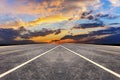 Empty, empty, straight-forward highway in the sunset Royalty Free Stock Photo