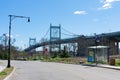 Empty Street and Bus Stop at Randalls and Wards Islands with the Triborough Bridge in the background Royalty Free Stock Photo