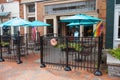 empty street cafe near restaurant in an old American town. Tables and chairs Royalty Free Stock Photo