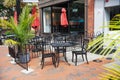 empty street cafe near restaurant in an old American town. Tables and chairs Royalty Free Stock Photo