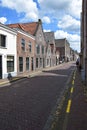 Empty street in the Dutch town Muiden with Muiderslot, Muiden Castle, Holland, the Netherlands