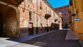 Empty Street in the Italian town Fossano in Province Cuneo, Region Piedmont, northern Italy. Royalty Free Stock Photo