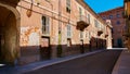 Empty Street in the Italian town Fossano in Province Cuneo, Region Piedmont, northern Italy. Royalty Free Stock Photo