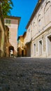 Empty Street in the Italian town Fossano in Province Cuneo, Region Piedmont, northern Italy. Royalty Free Stock Photo