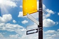 Empty street signs or road sign and a banner on the pole against cloudy blue sky background Royalty Free Stock Photo