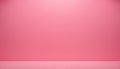 Empty studio with a soft pink seamless backdrop and a subtle gradient floor for product display Royalty Free Stock Photo