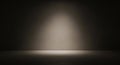 Empty Studio Spotlight with Dark Walls and Floor Creating Dramatic Lighting Keywords: studio Royalty Free Stock Photo