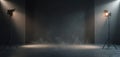 Empty studio stage with smoke and spotlights. Dark concrete floor and walls create atmosphere for presentation or performance. Royalty Free Stock Photo