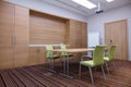 Empty stylish meeting room equipped with video projector. Royalty Free Stock Photo