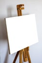 An empty subframe on an easel with a place to insert an image