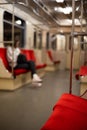 Empty subway carriage, inside modern metro train. Window and seats of metro wagon. Concept of city underground transport. Royalty Free Stock Photo