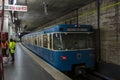 Almost empty subway station Sendlinger Tor under reconstruction with departing subway train during 2020 spring Covid-19outbreak