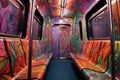 empty subway train seats with colorful patterns Royalty Free Stock Photo