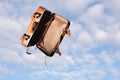 Empty suitcase in mid-air Royalty Free Stock Photo