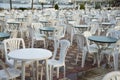 Empty summer resort because of pandemic. Plastic chairs and tables Royalty Free Stock Photo