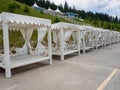 Empty sun loungers stand under a canopy Royalty Free Stock Photo