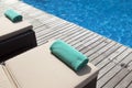 Empty sunbeds near swimming pool Royalty Free Stock Photo