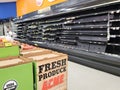 Empty supermarket shelves in Acme food market