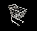 Empty supermarket shopping cart isolated on black background Royalty Free Stock Photo