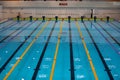 Empty swimming pool without people with quiet standing blue, clear water. Water sports in indoor pool.