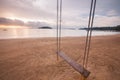 Empty swing on the beach Royalty Free Stock Photo