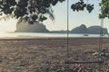 Empty swing on the beach vintage color tone Royalty Free Stock Photo