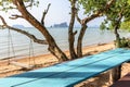 Empty swing & picnic table on beach during covid-19 lockdown, Thailand Royalty Free Stock Photo