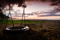 Empty Swing On Sunset In Public Park Royalty Free Stock Photo