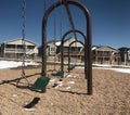 Empty swings on a playground Royalty Free Stock Photo