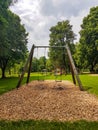 Empty swings at public park Royalty Free Stock Photo