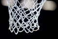 Empty Swooshing Basketball Net Close Up with Dark Background Royalty Free Stock Photo