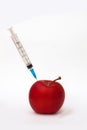 Medical syringe and Red Apple Royalty Free Stock Photo