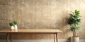 Empty table against beige textured wall background. Composition with glossy leaves on the wall Royalty Free Stock Photo