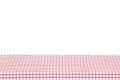 Empty table background. Empty wooden deck table covered with red white checkered tablecloth isolated on a white background. Space Royalty Free Stock Photo