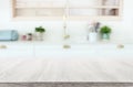 empty table board and defocused modern kitchen background. product display concept Royalty Free Stock Photo