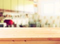 Empty table board and defocused retro kitchen background.