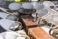 Empty table and chairs in restaurant, Greece. Beach cafe near sea, outdoors. Travel and vacation concept Royalty Free Stock Photo